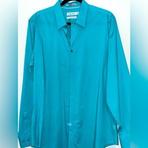 Calvin Klein man’s button down shirt. Long Sleeve. Turquoise color dress shirt